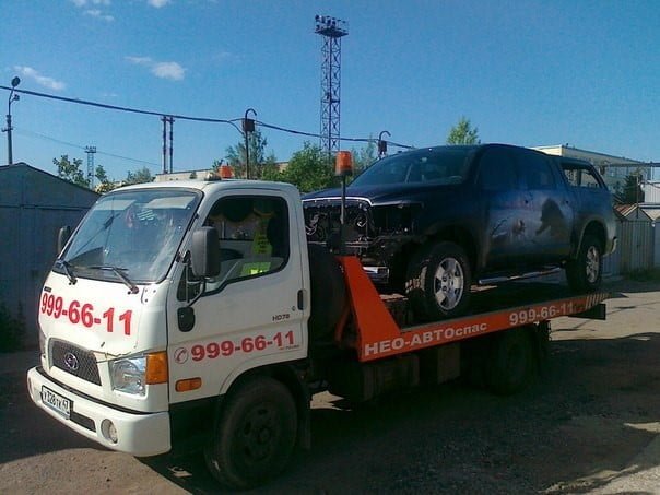 Эвакуатор со сдвижной платформой и лебедкой