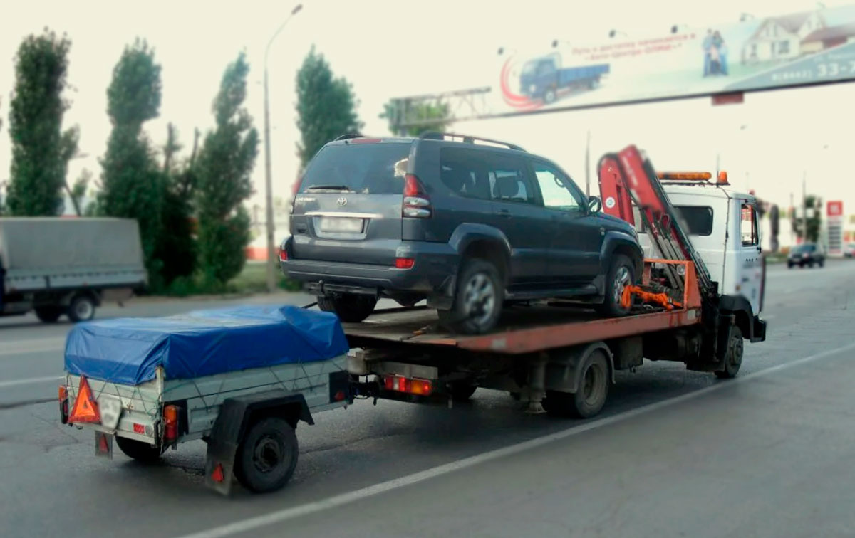 Эвакуация машины с прицепом
